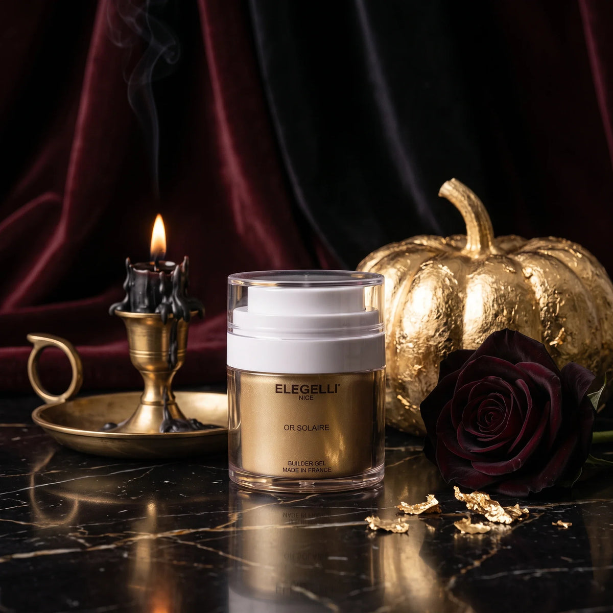 Elegelli builder gel Or Solaire with a gilded pumpkin and a black rose