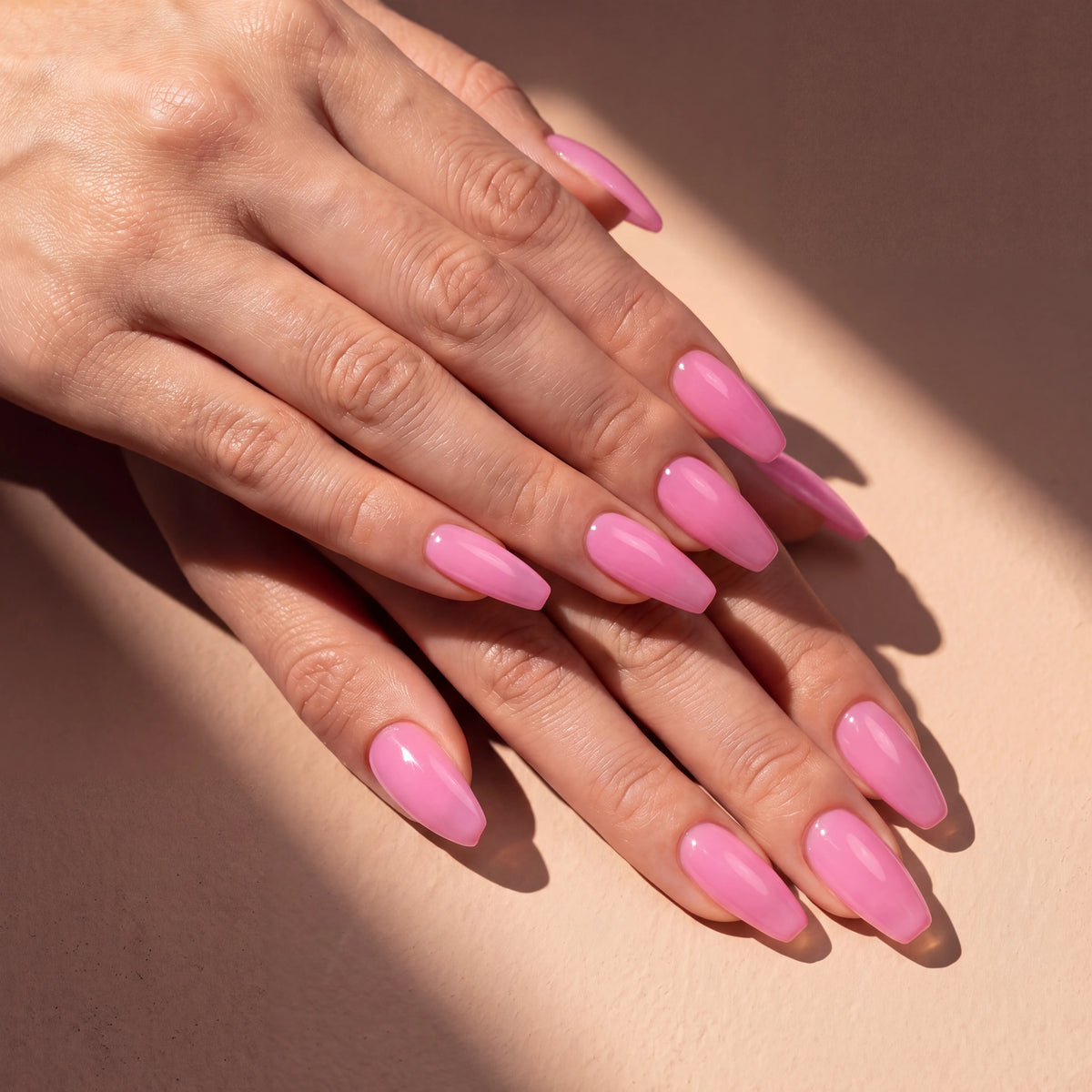 Builder Gel B022 Rose Pop Elegelli - bright pink nails in sunlight
