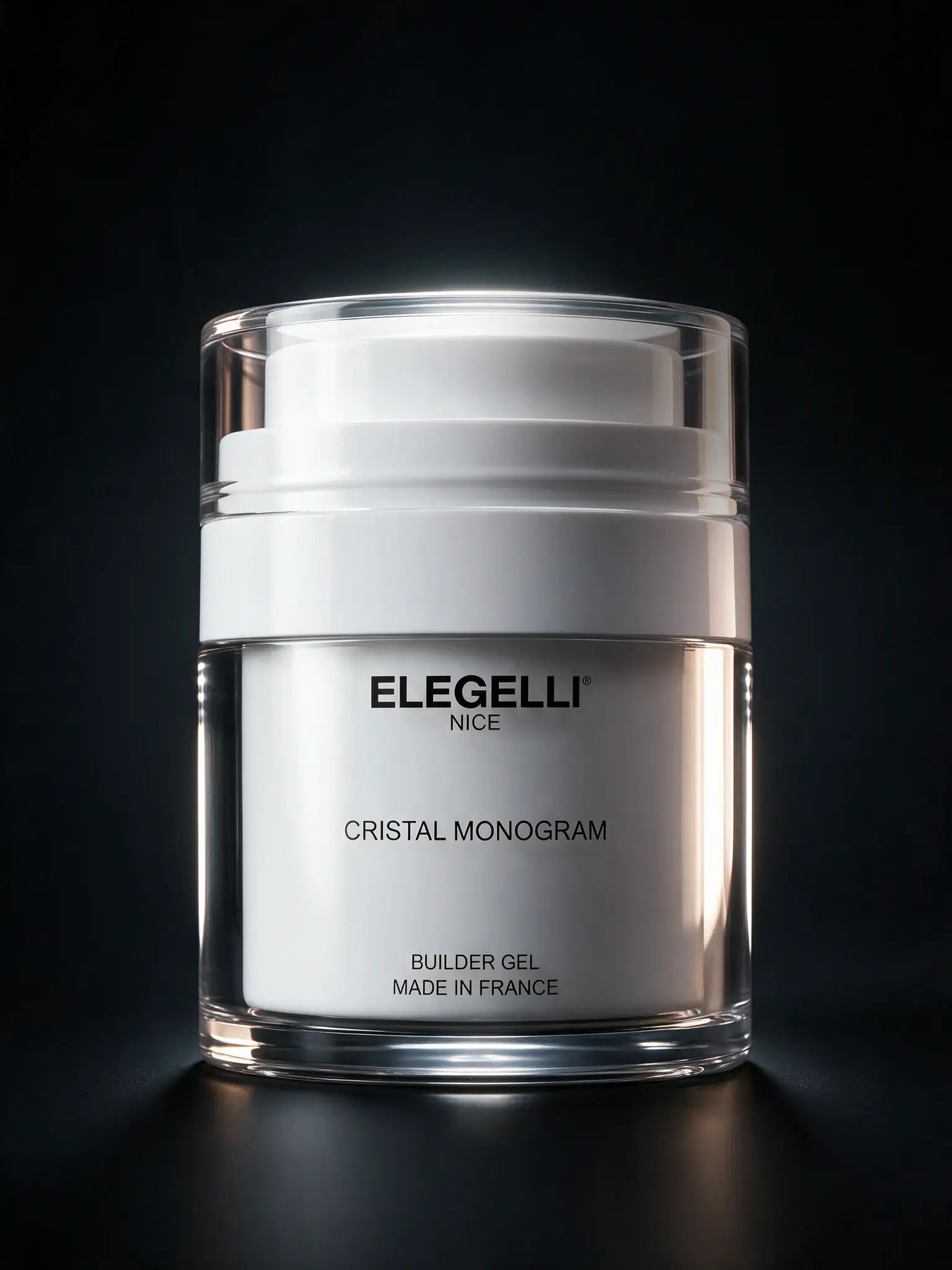 The builder gel jar standing centred on near black, rim lit