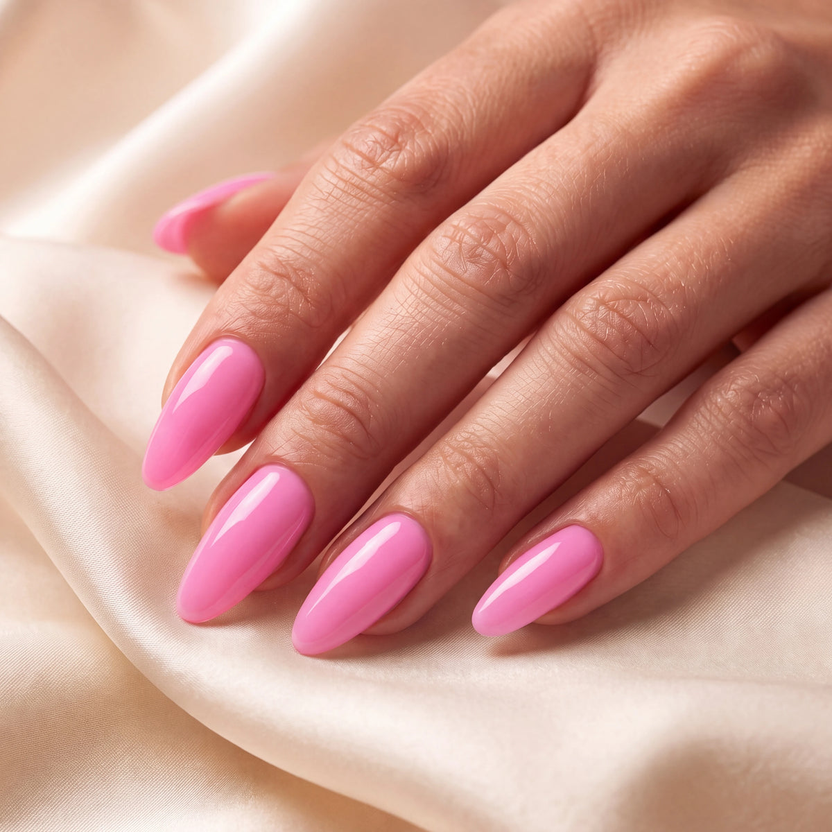 Builder Gel B022 Rose Pop Elegelli - close-up of bright pink almond nails on silk