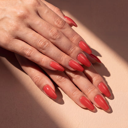 Builder Gel B021 Rouge Capucine Elegelli - coral red nails in sunlight